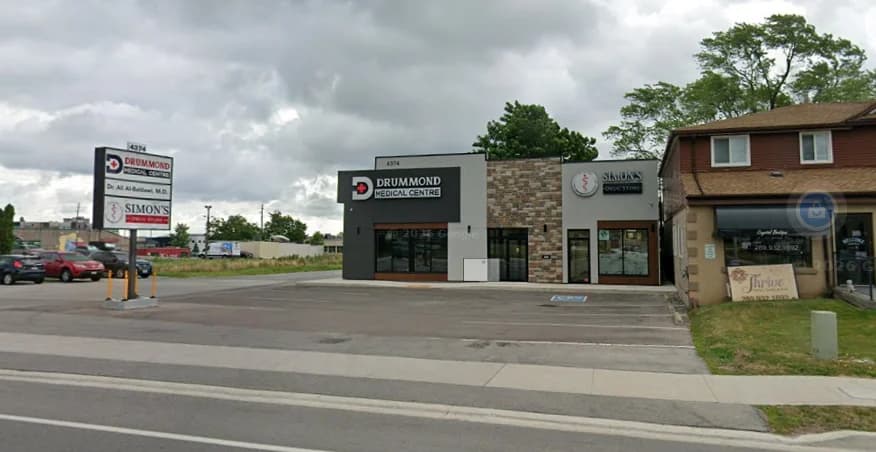 Supplied street photograph of Drummond Medical Centre at 4374 Drummond Road showing the clinic and pharmacy frontage, pylon sign and adjoining building