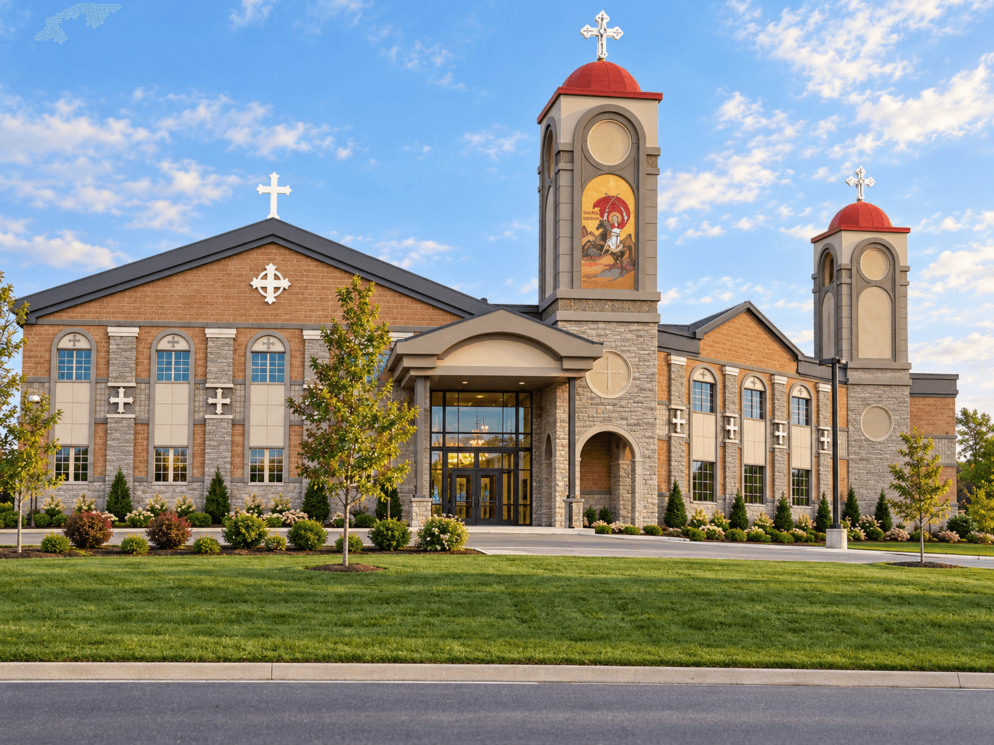 Enhanced exterior view of St. Philopater Church in Guelph with brick and stone walls, arched windows, landscaped grounds and red-domed towers topped by crosses